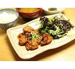 Delicious teriyaki chicken plate with rice and salad