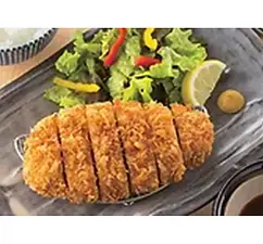 Delicious breaded pork cutlet with side salad