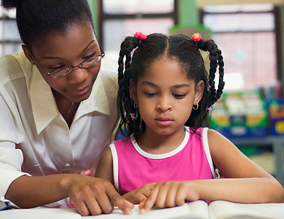 Teacher and Young Student_edited.jpg