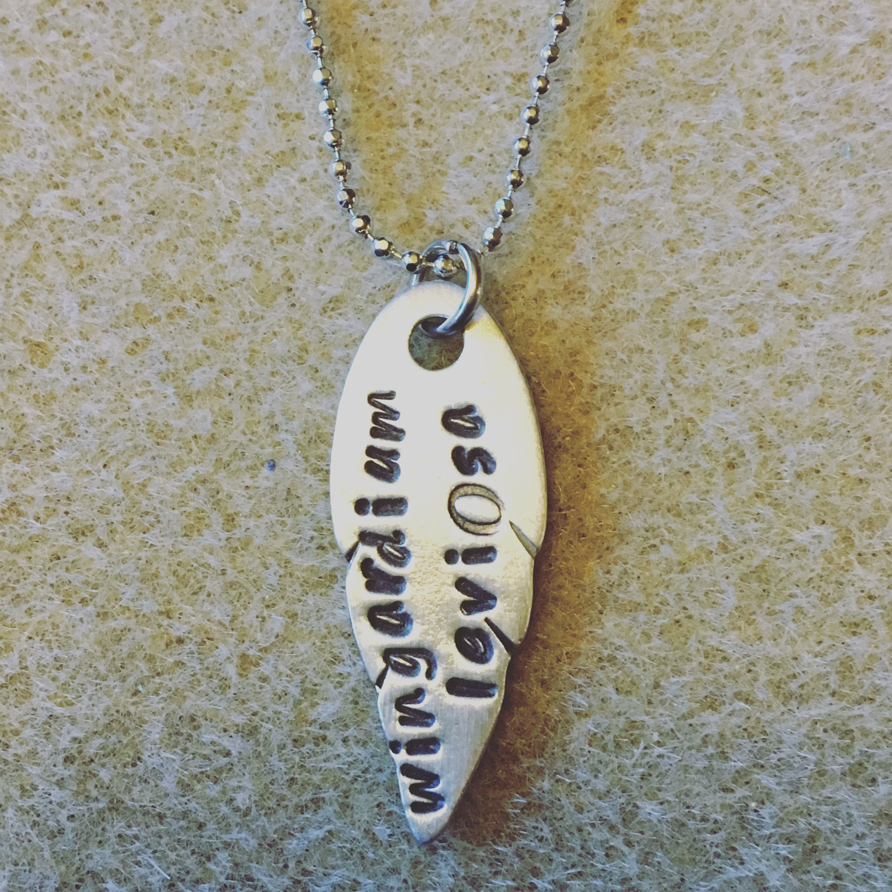 Wingardium leviOsa stamped necklace