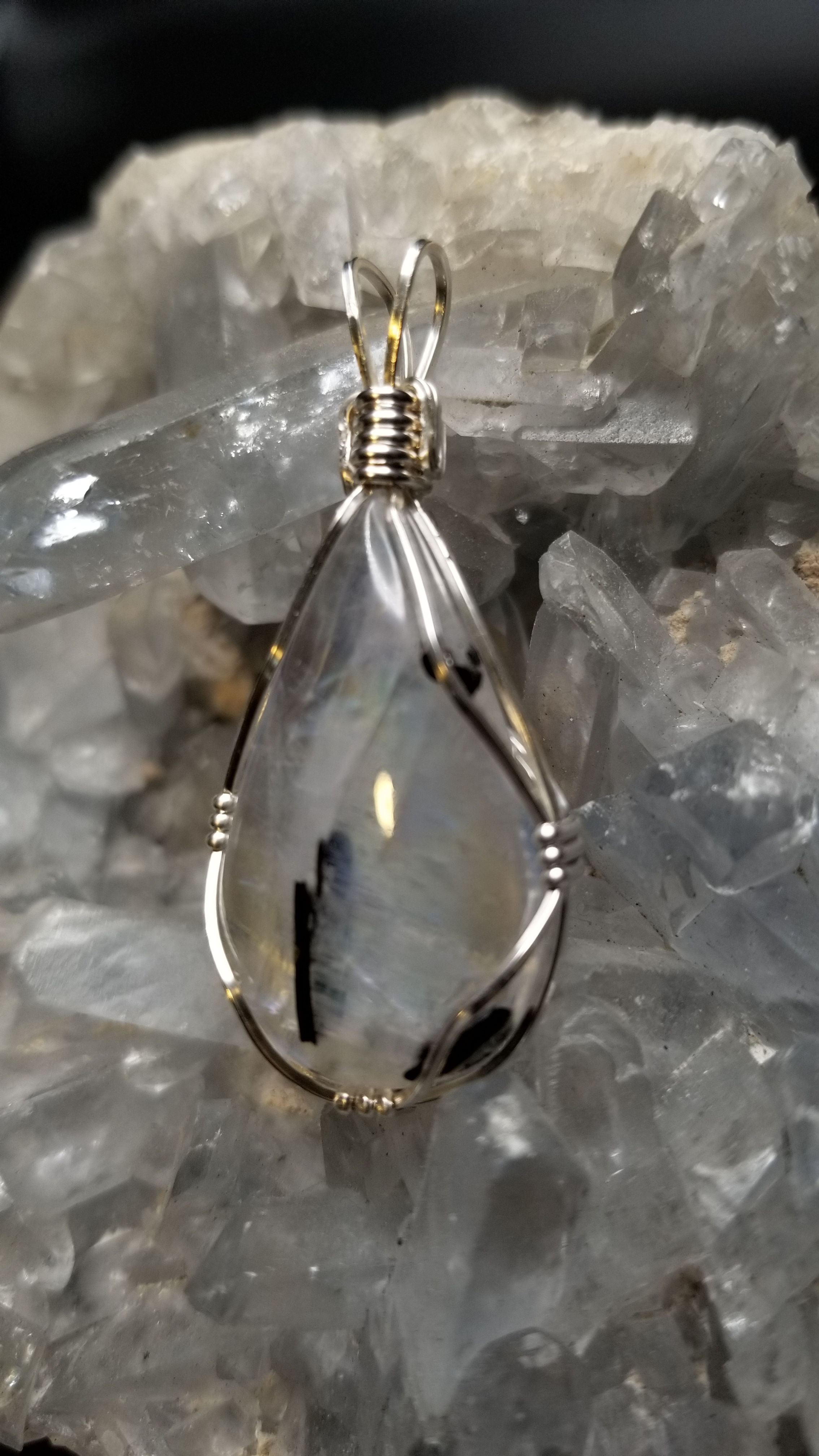 Rainbow Moonstone with Black Tourmaline wrapped in sterling silver