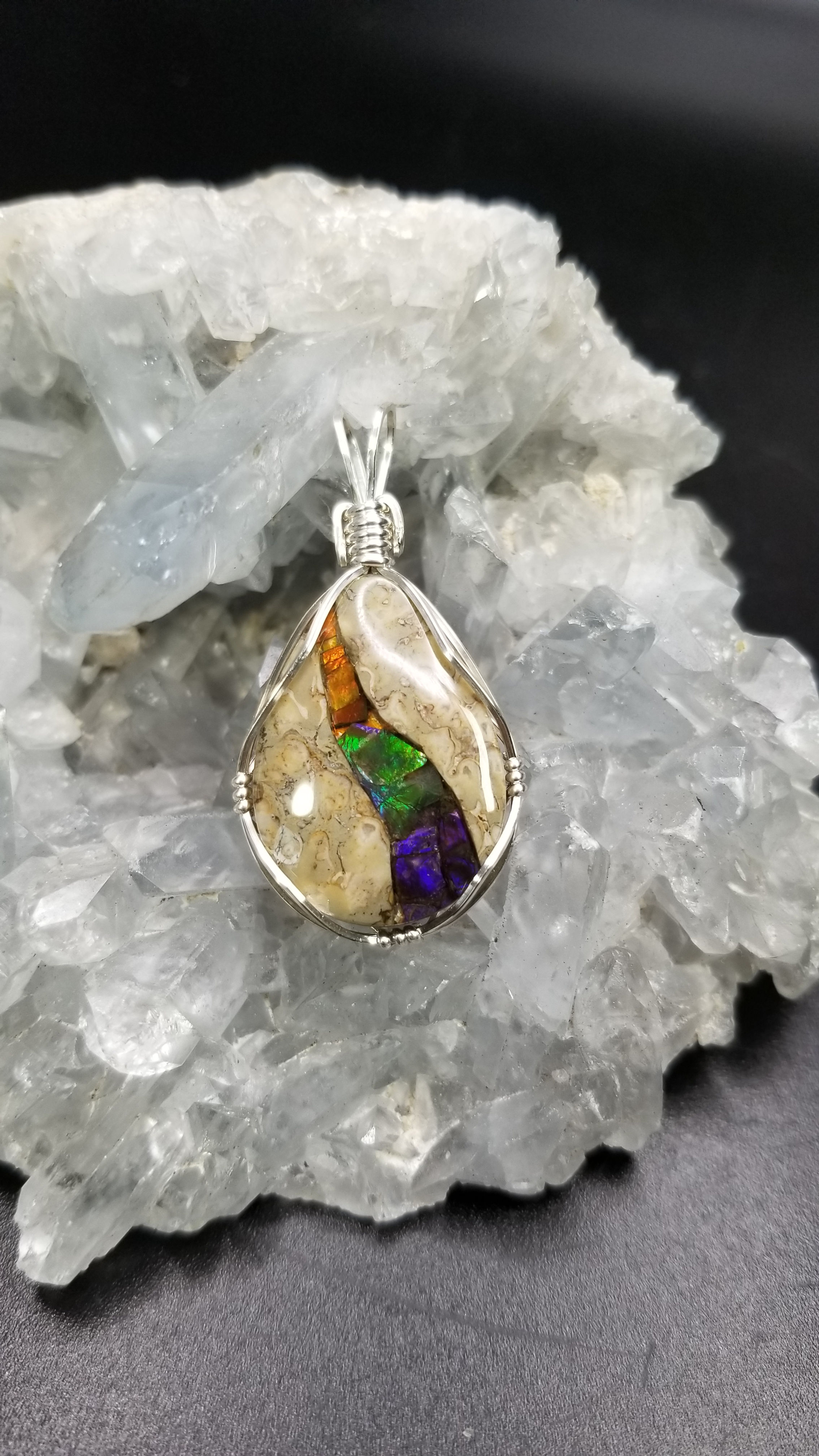 Dinosaur Bone with Ammolite Inlay wrapped in Sterling Silver