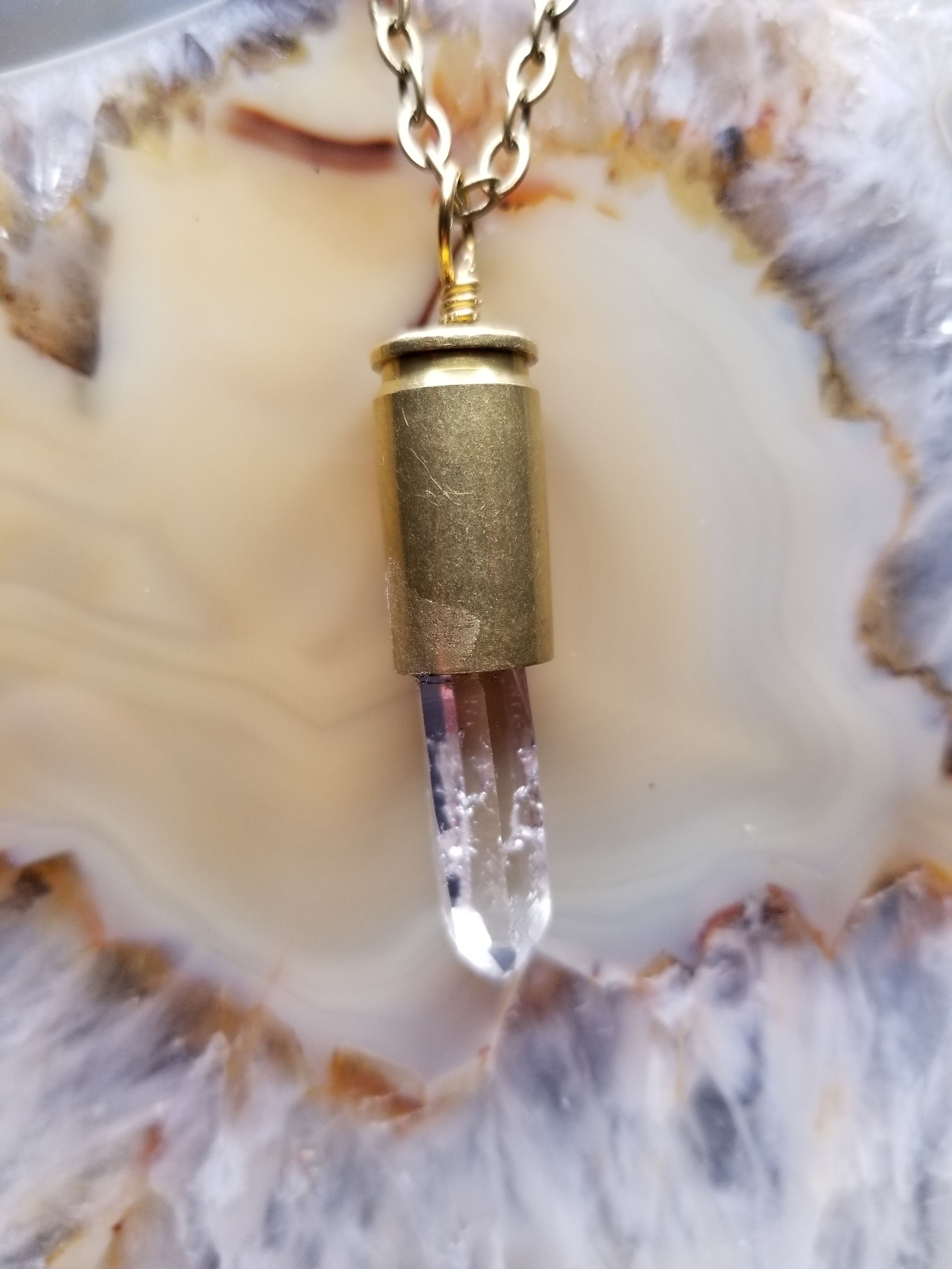 Bullet casing necklace with clear crystal point