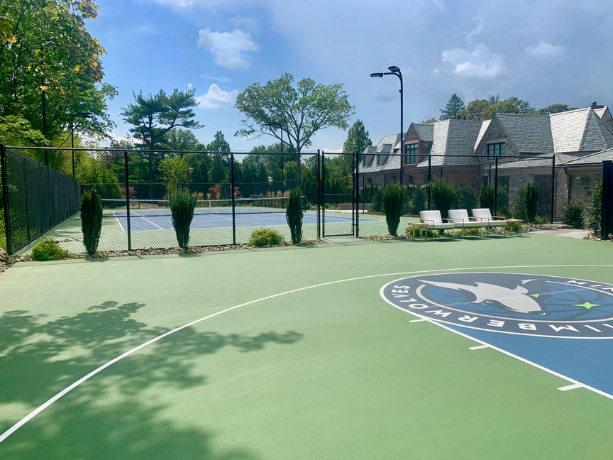 finished ProBounce tennis and basketball court with custom logo, hand painted, basketball, pickleball, lights, Minnesota Timberwolves, inspiration, photo, photography, picture, us open colors, blue, green, light, dark, amazing, landscape, top, 10, beautiful