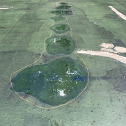 bird bath low areas on green tennis court