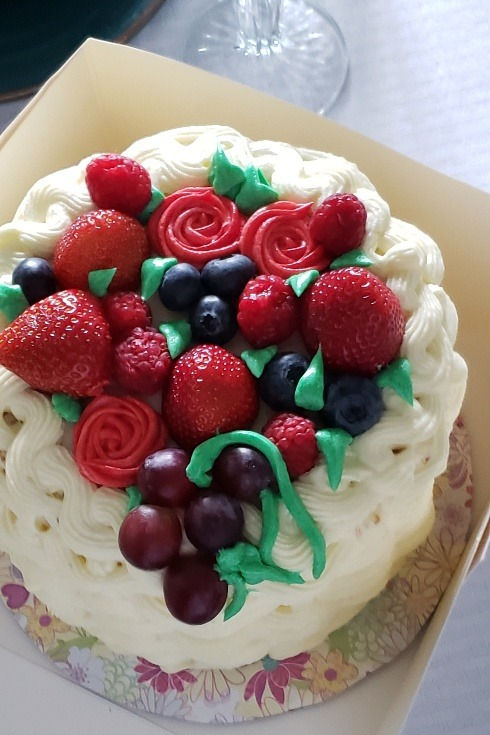 6_chocolate cake whipped cream topped w_fresh fruits