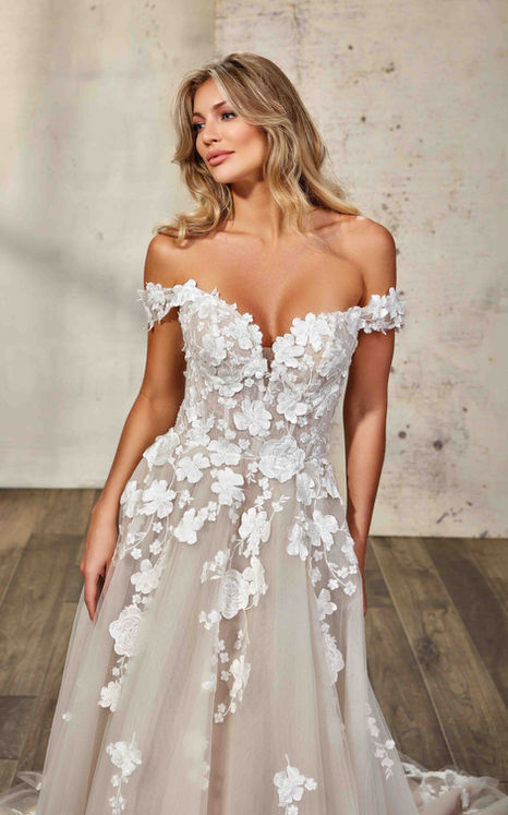 Eddy K ballgown with ivory lace over champagne tulle, 3D appliqués and mocha matte lining and buttons to end of train.