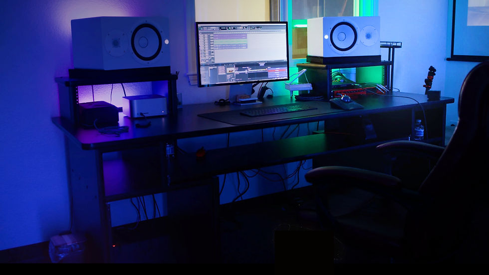 Close-up view of mixing console with EQ and spectral editing software