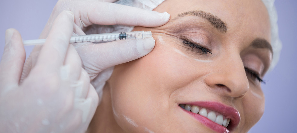 woman-with-marked-face-receiving-botox-injection.jpg