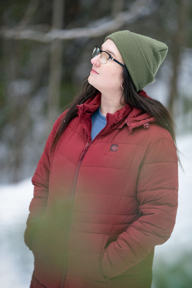Carly looking off into the distance wearing an Ororo heated jacket, part of winter lifestyle content.