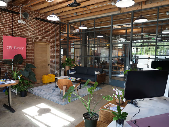 Office Suite Picture. Office furniture, exposed brick wall, glass wall.