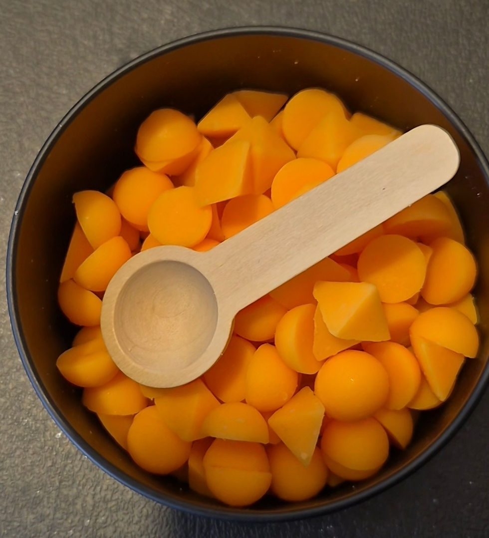 Close-up view of wax melts in a ceramic warmer