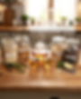 Herbal tea cleanse: pot, cups, and ingredients on counter.