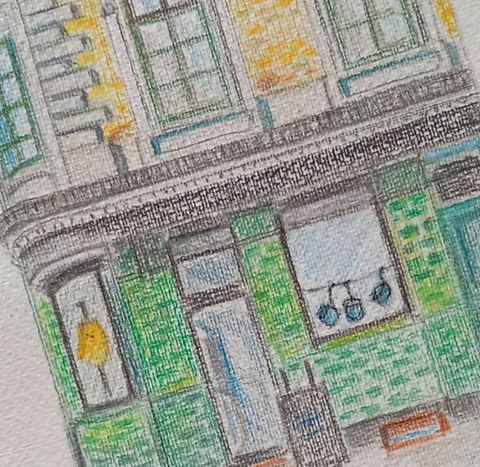 store front detail in wooden crayons