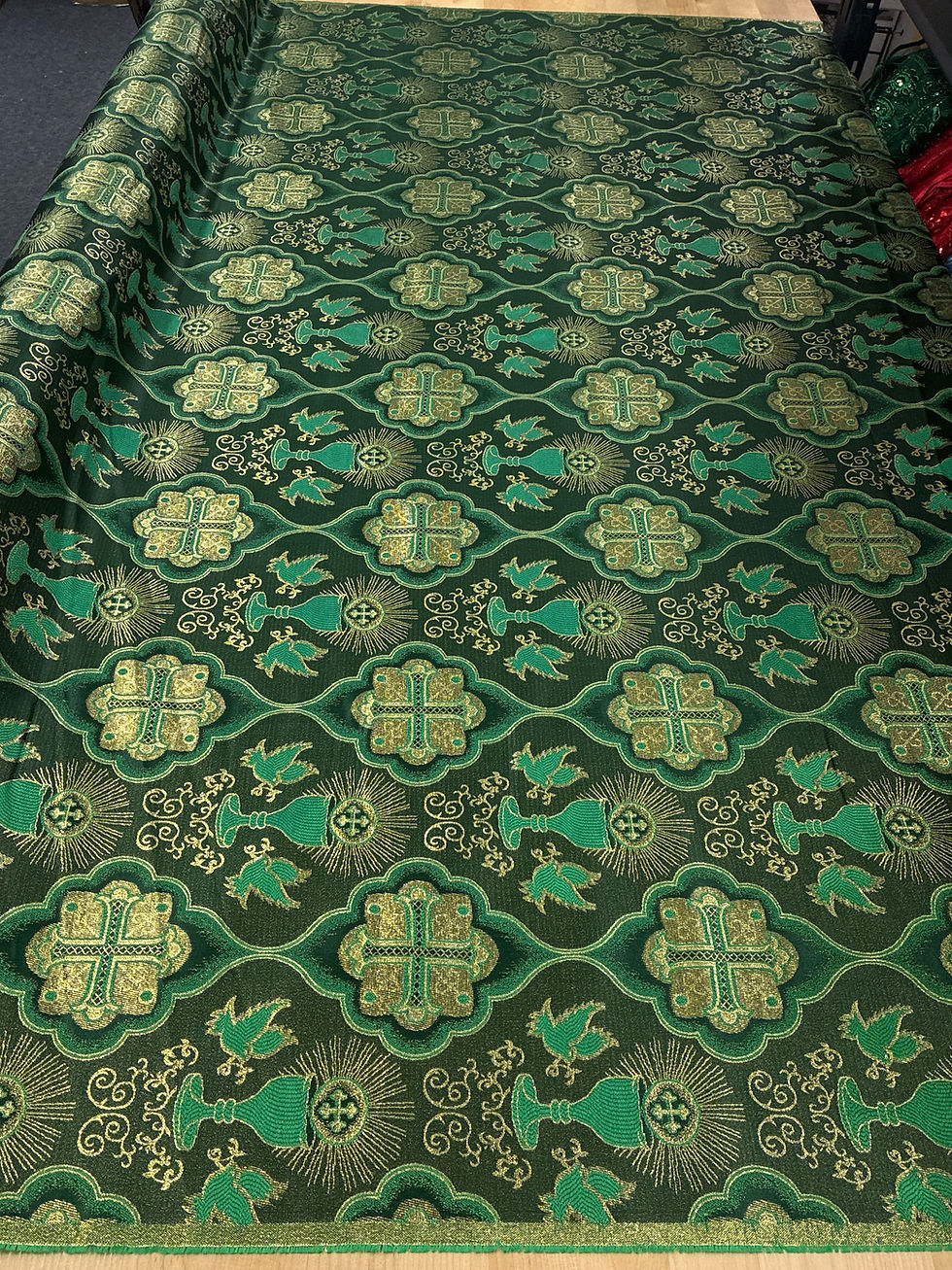 green brocade fabric top view