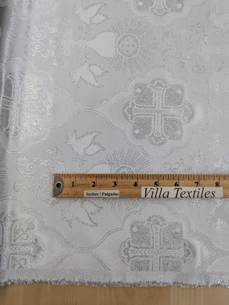 Thumbnail: brocade fabric with ruler