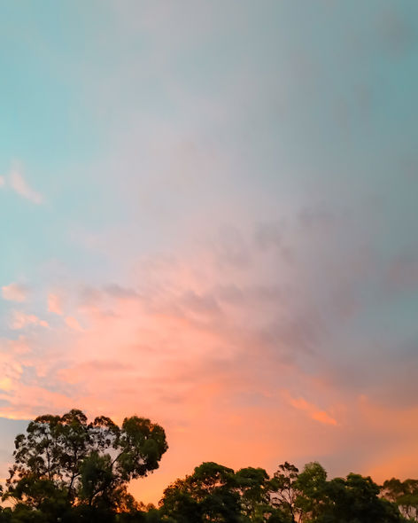 Pink clouds on a summer day landscape photography by Jacqui Stewart