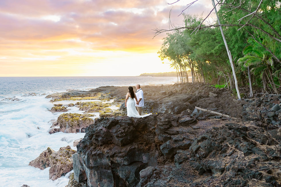 Couple posing along the dramatic steep volcanic cliffs at Mackenzie State Recreation Area during the sunset.