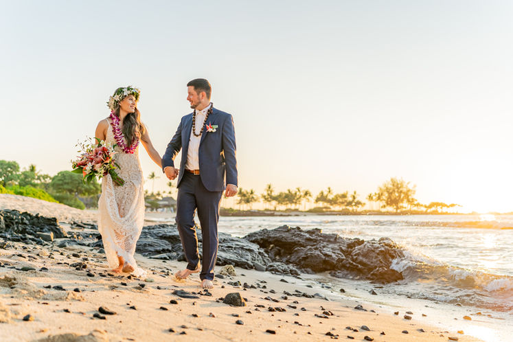 Couple just married on beach in Hawaii with Simple Hawaii Elopements in Kailua Kona Hawaii