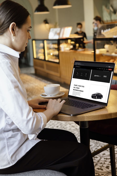 woman using macbook pro in the cafe