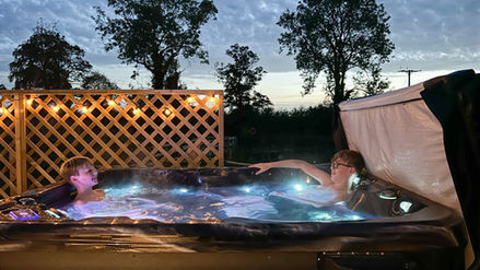 Family glamping holidays with a hot tub.