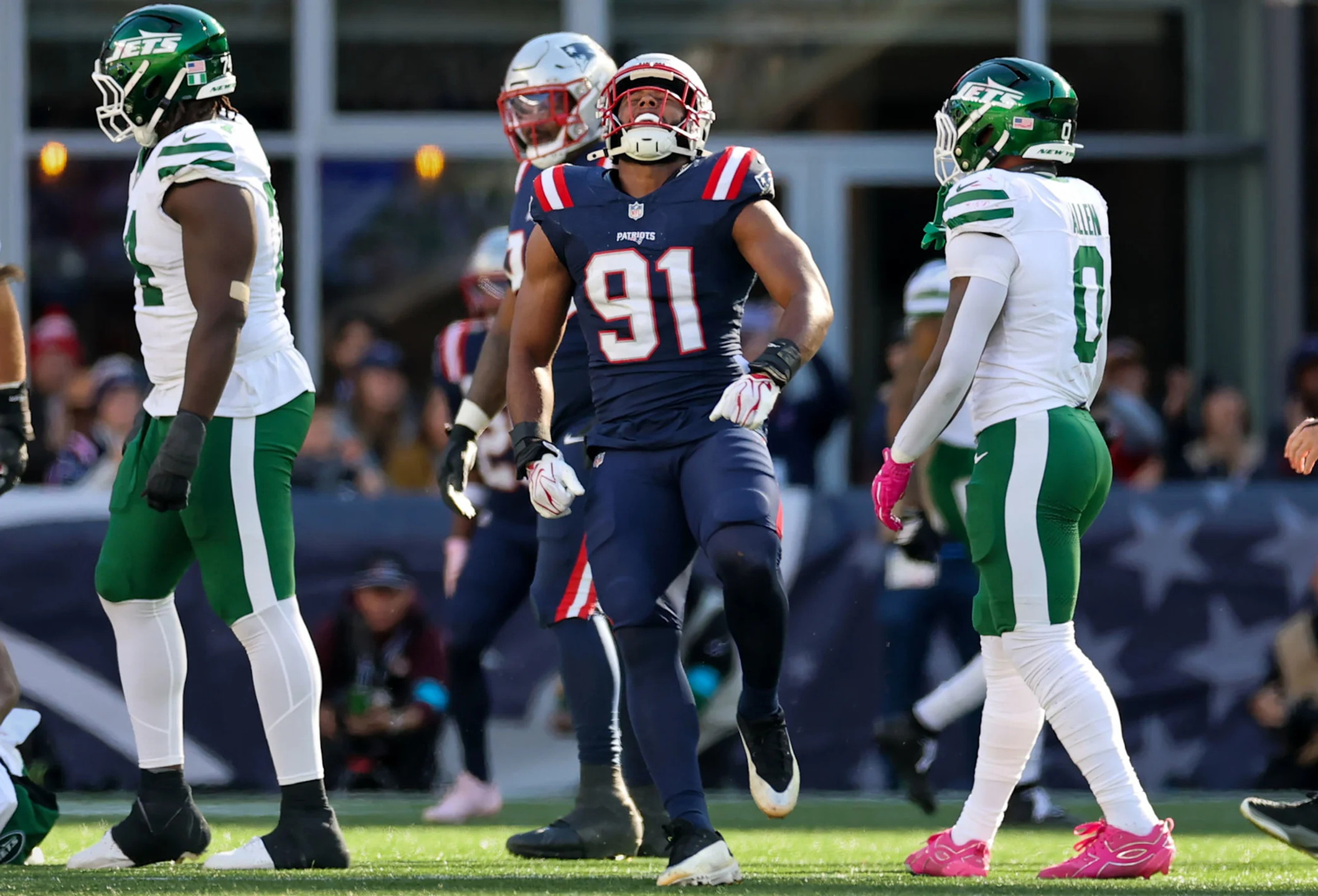 Elijah Ponder celebrates racking up his fifth and a half sack. Photo Courtesy: Eric J. Adler/New England Patriots