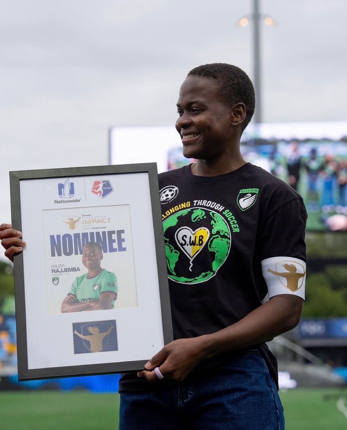 Fauzia Najjemba is honored at halftime for the Lauren Holiday Impact Award. Photo Courtesy: bostonlegacyfc Instagram