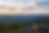 Person overlooking mountains.png