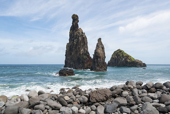 rocks-sea-against-sky.jpg