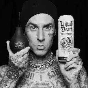 Black and white image of a person holding Liquid Death canned water and branded bottle, illustrating how the brand positions itself as a bold alternative in social and lifestyle moments.