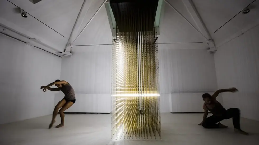 Contemporary dance performance in an abstract installation space, representing how physical movement fuels creativity and original thinking in the age of AI - OSER