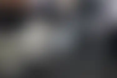 Blurred crowd walking on a zebra crossing in a city street, representing bold thinking and brands choosing distinct paths in the next era of AI-powered growth - OSER