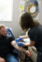 man receives iv nutrient infusion at restore therapy spa in westminster, md