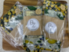 Several Beeswax wraps with BZ by Agnes logo, thank you sticker. Floral design patterns.