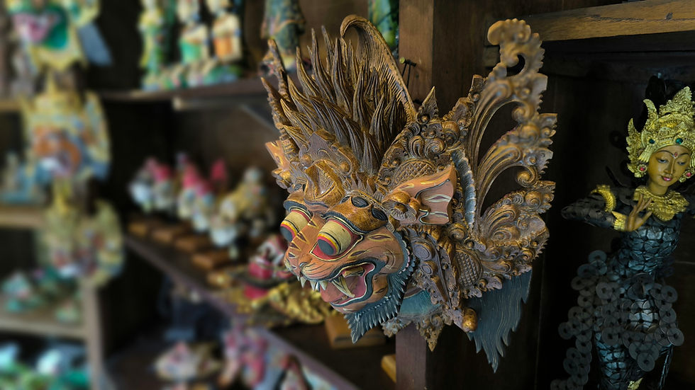 Handcrafted Balinese Narasimha mask featuring detailed traditional wood carving and powerful lion guardian symbolism.