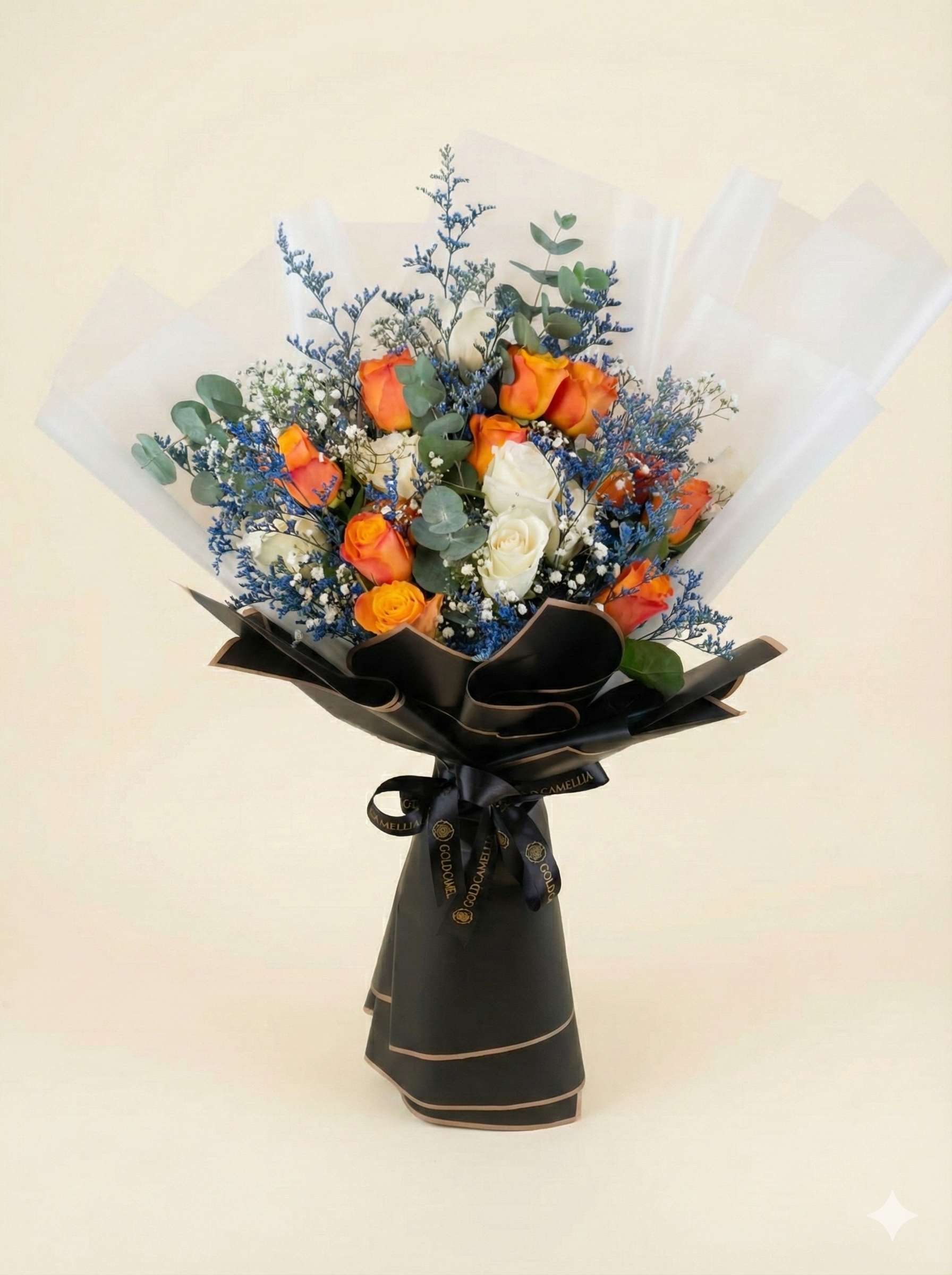 Modern orange and white flower bouquet with black wrapping in Dubai