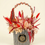 Thumbnail: Rustic dried flower basket with red preserved botanicals in wooden container