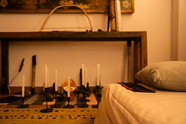 Ceremonial space with candles and iboga medicine tools
