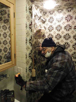 OUCH! Outlet too close to shower!