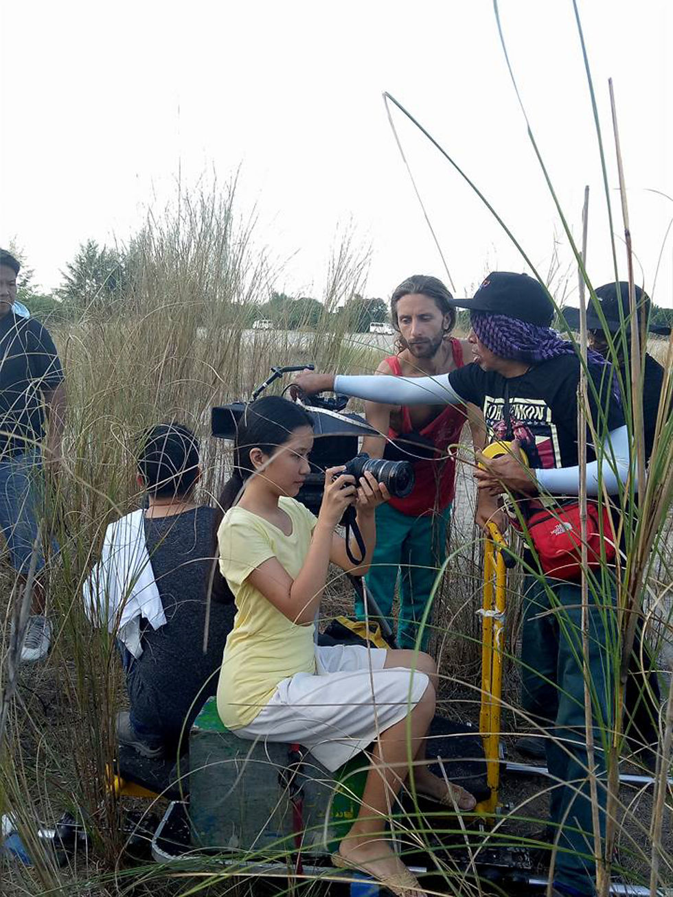 Film crew positioning camera equipment outdoors — CineBandits production gallery