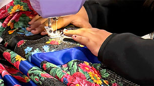 image of girl sewing
