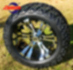 14" machined nd black Vampire wheel with All-Terrain tires.