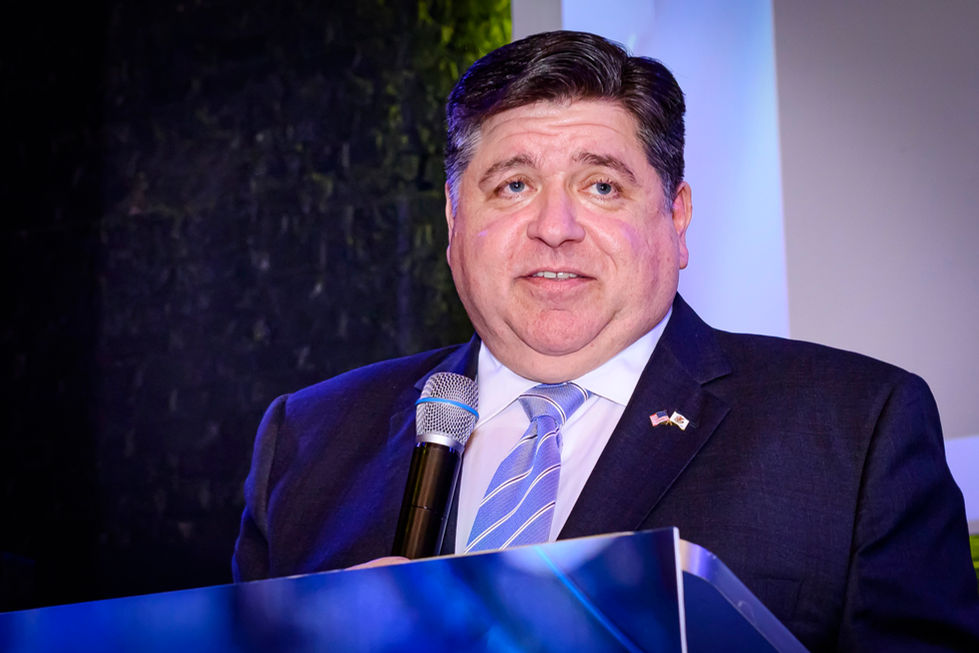 Governor J. B. Pritzker speaking in Illinois