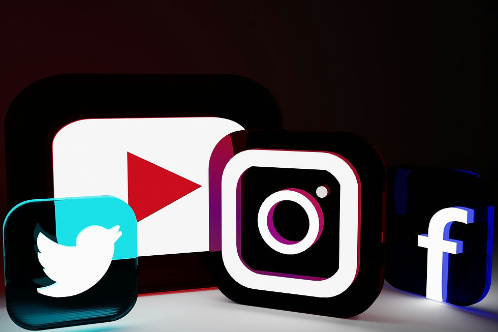 Picture showing custom light signs of the logos of all major social media platforms