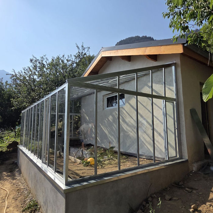 serre en verrière galvanisée Vaujany - vue d'ensemble
structure acier galvanisé serre sur mesure Demod Métal
porte vitrée serre jardin Vaujany
fenêtre intégrée serre verrière montagne
toiture vitrée inclinée serre sur mesure