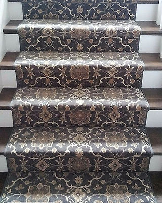   The medallion pattern in this contemporary Oriental stair runner is flawlessly centered, creating 