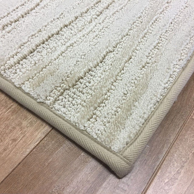 BOUND EDGE on corner sampe of carpet.