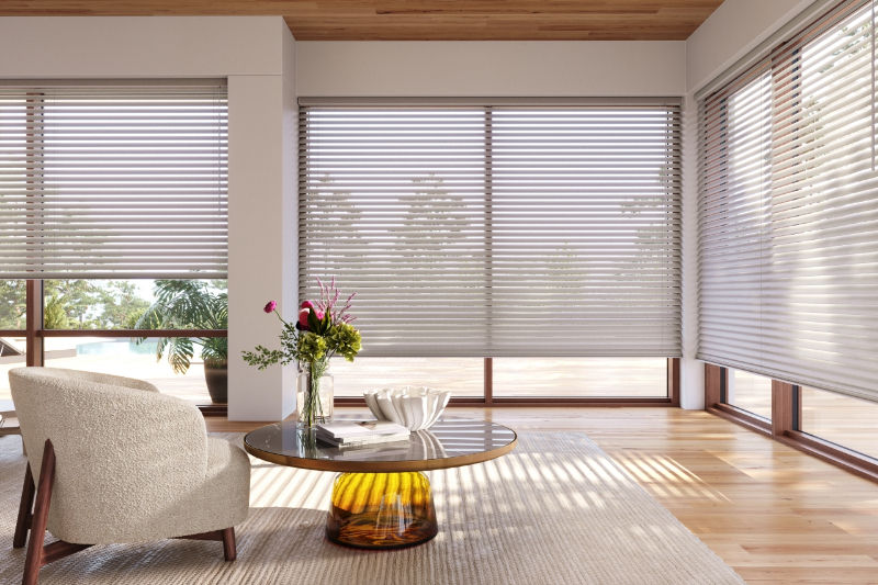 Hunter Douglas Aria Soft Shades add an architectural touchto a well-lit modern living space.