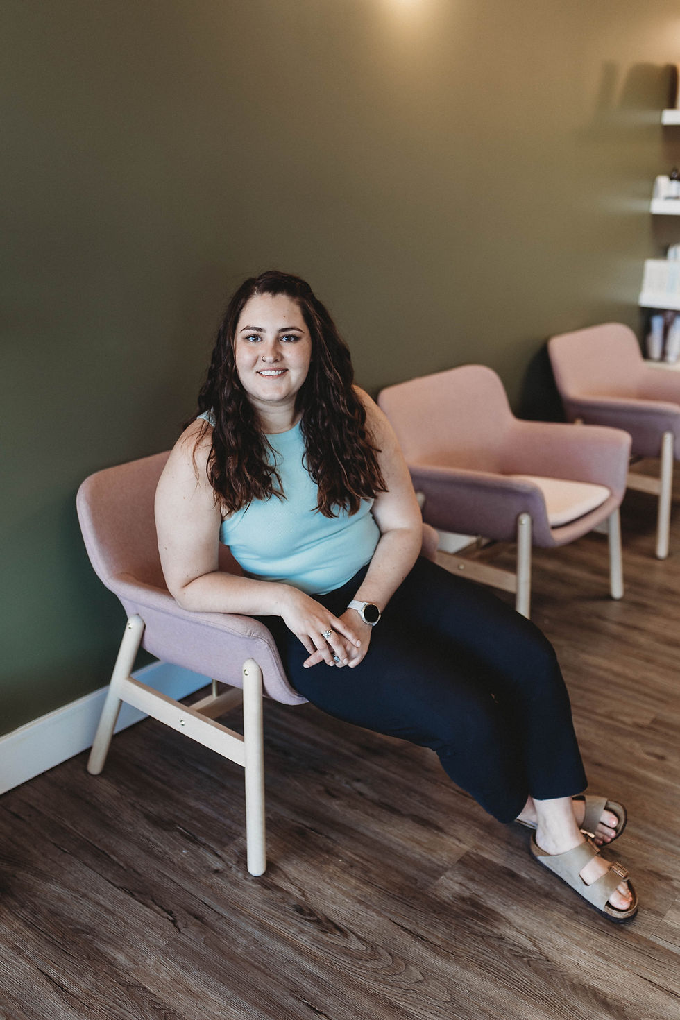 Dr. Kaitlyn Newton greeting chiropractic patients at full moon physiotherapy
