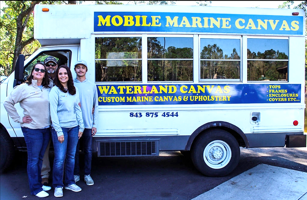 Chet, Ada, Katelyn & CJ with the original Waterland Canvas bus design in Charleston, South Carolina